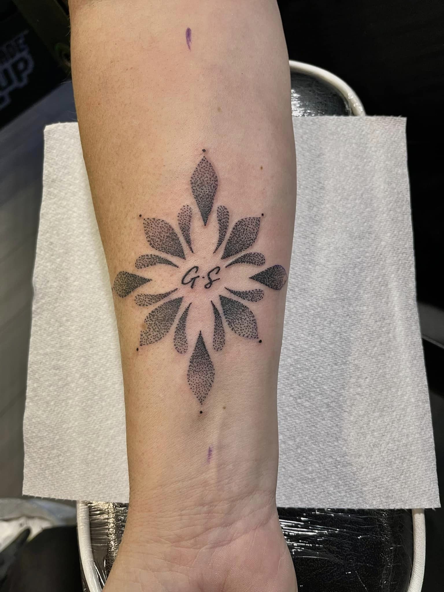 dot work with initials tattoo
